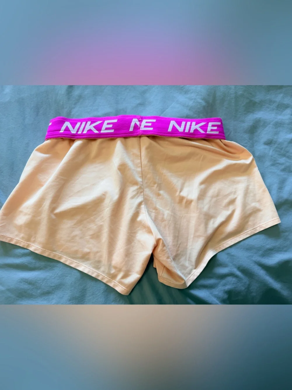 Nike Women’s Dri-Fit Peach Athletic Shorts with Pink Branded Waistband